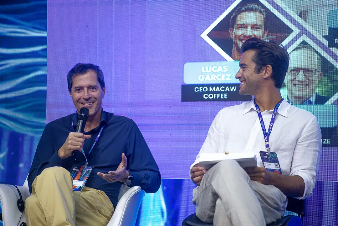 Marcelo Urtado and Lucas Garcez on the panel